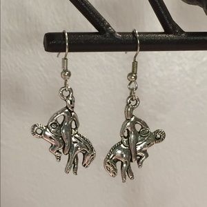 4/$15 ~ Silver rodeo earrings